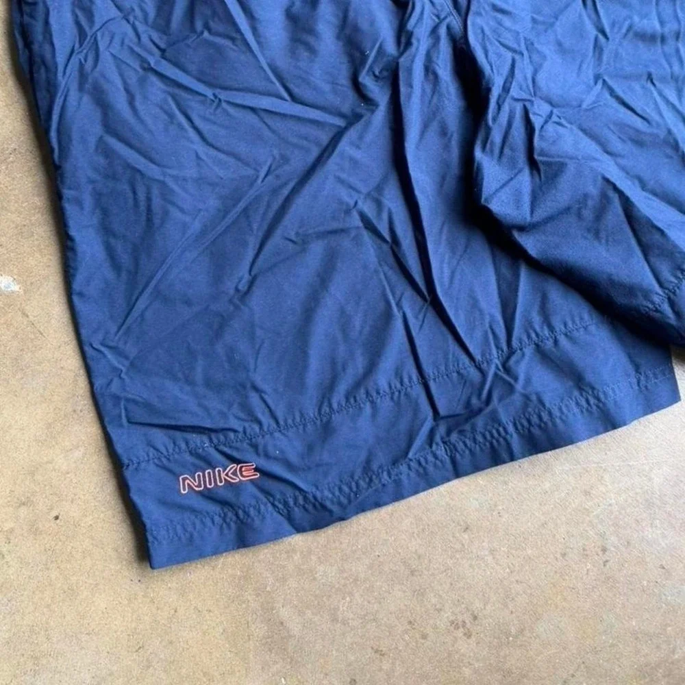 Vintage Y2K Nike spell out navy blue swim trunk shorts size L